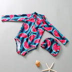 Children's swimsuit with watermelon pattern on a gray background