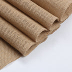 Rolled-up piece of burlap fabric on a white background